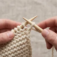 Knitting pattern and chart on table